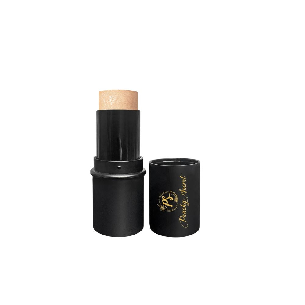 Highlighter stick with peach-gold tip in black tube and open cap container