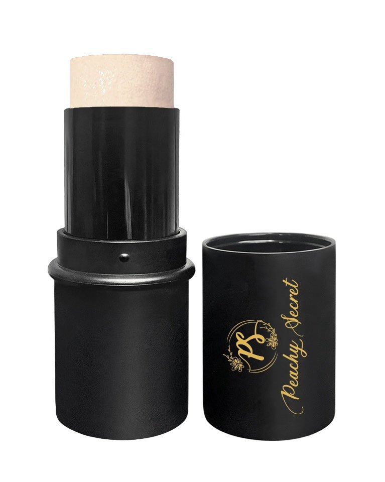 Botanical highlighter stick in pale champagne tone with black cap and tube