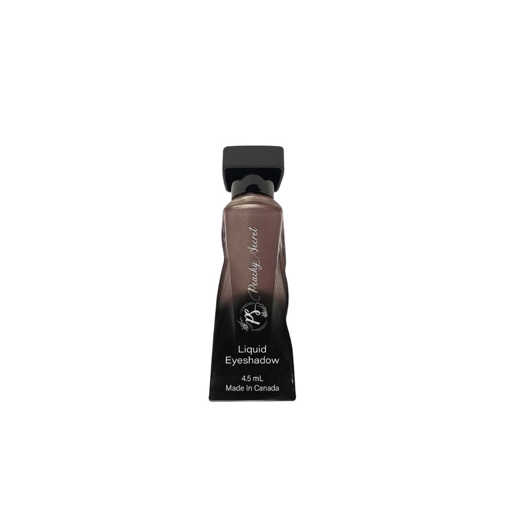 Liquid eyeshadow tube with taupe-brown shade and black cap