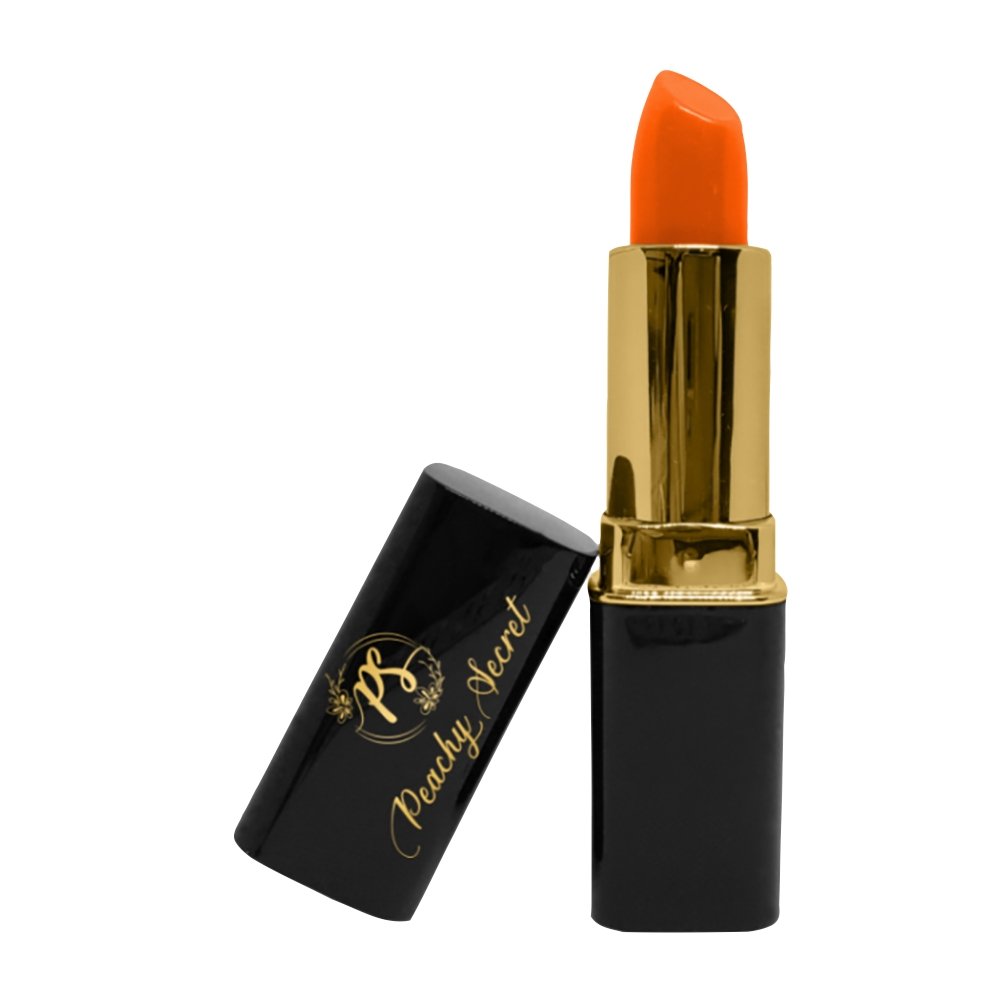 Glossy lip tint lipstick with orange cap and gold tube, black base