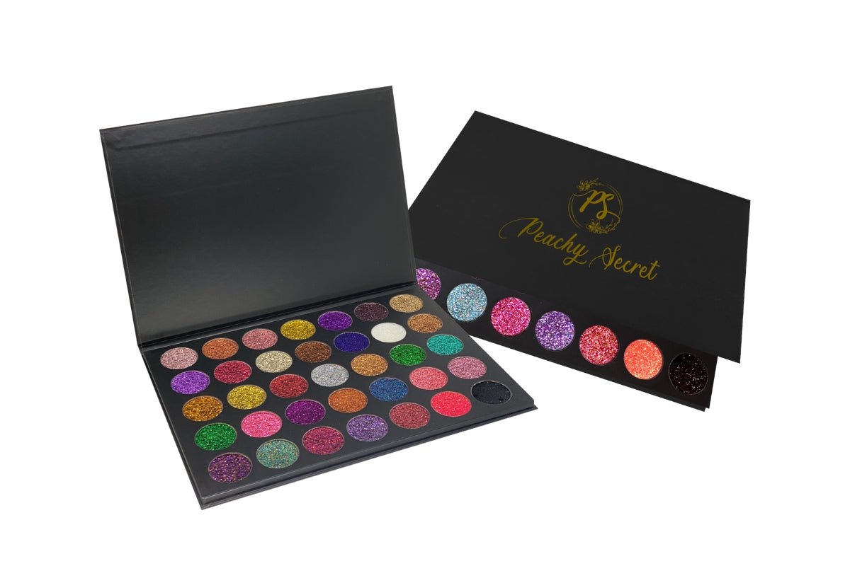 Glitter eyeshadow palette with colorful shimmer pans, open compact and outer box