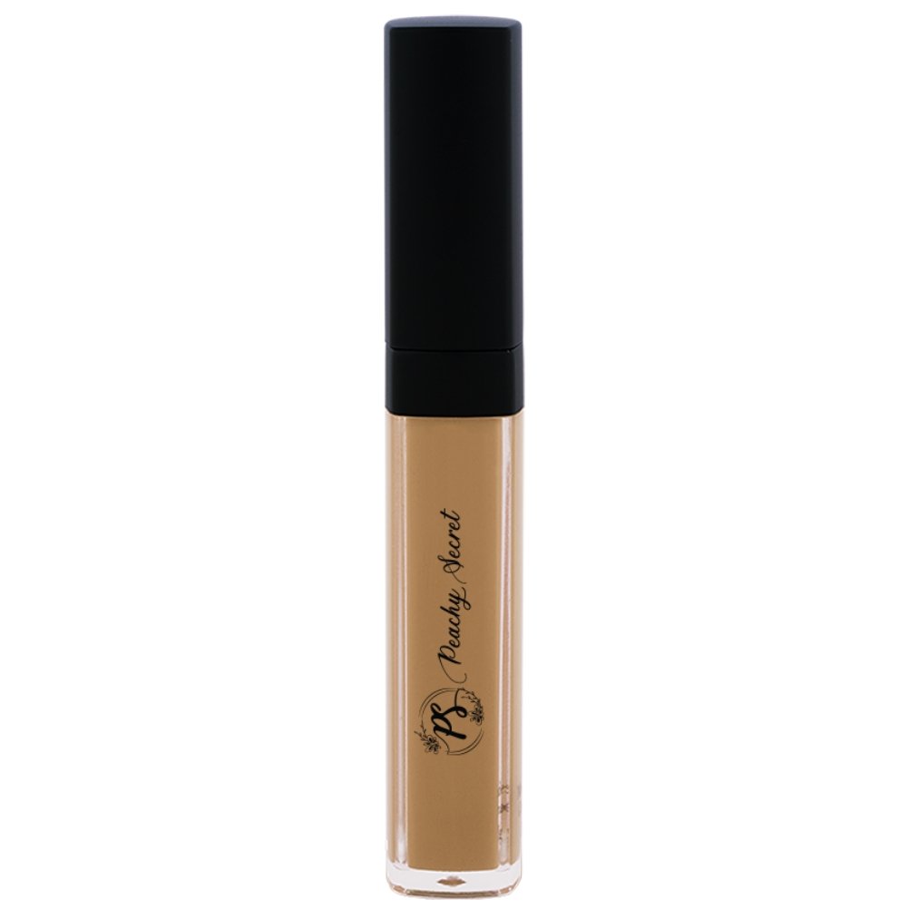 Liquid concealer in light tan in clear tube with black cap