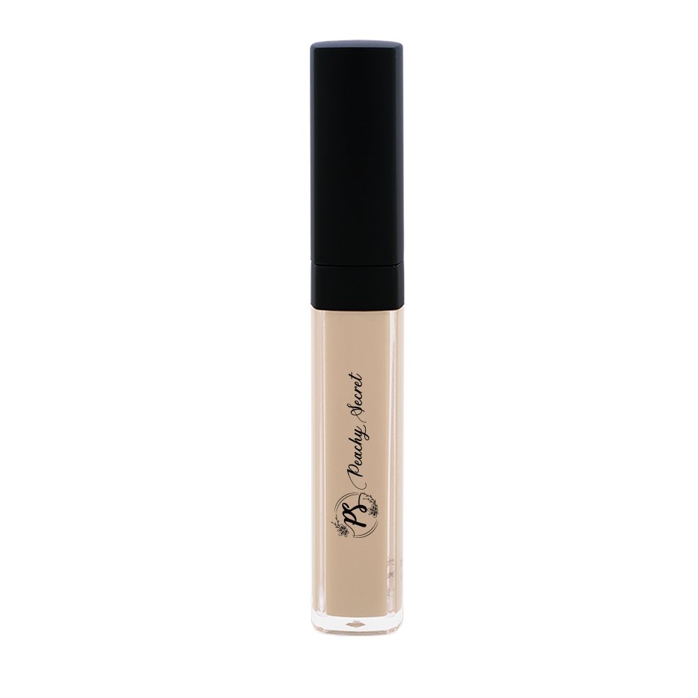 Liquid concealer in light beige in clear tube with black cap