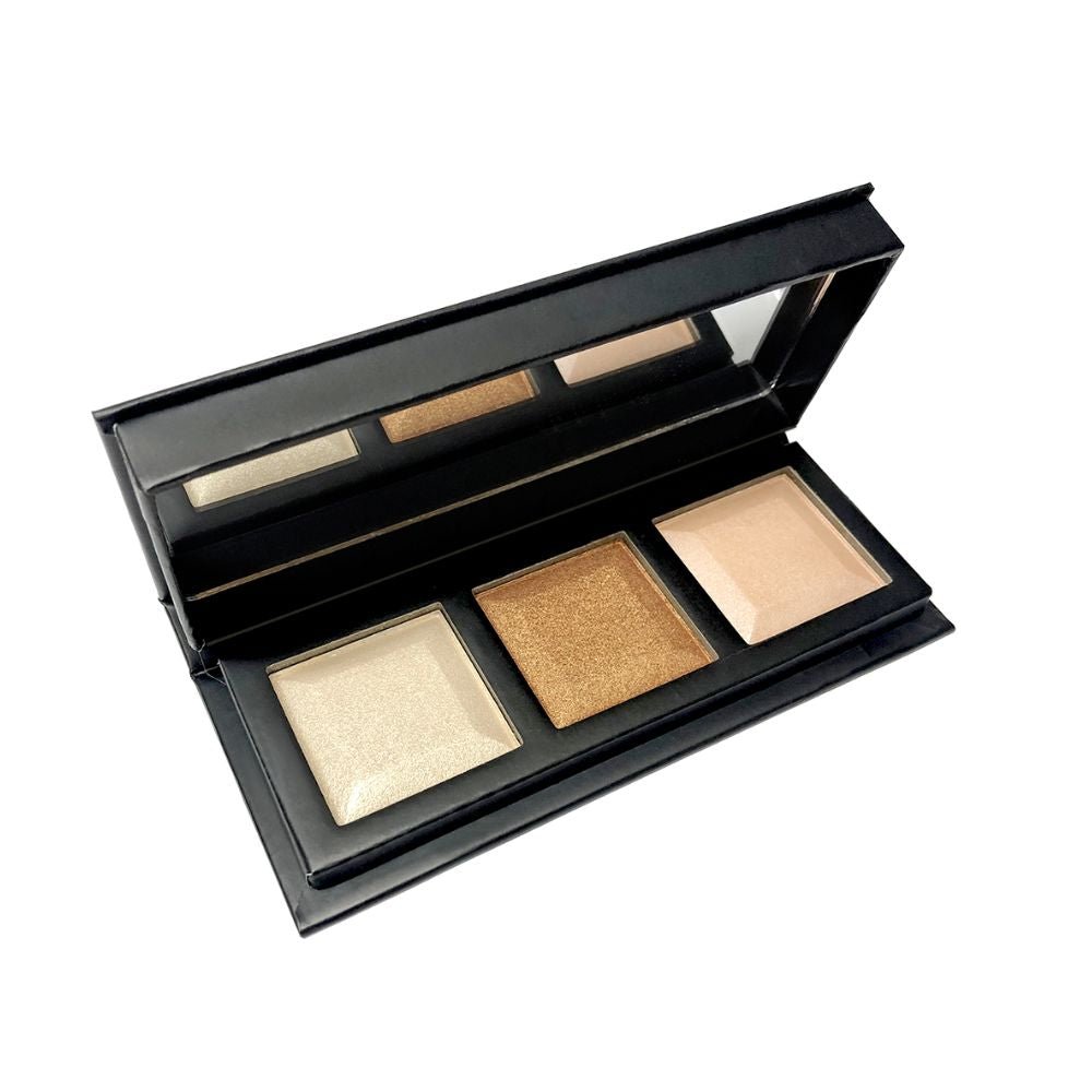 Face highlighter palette with four shimmer shades: white, gold, beige, and bronze.