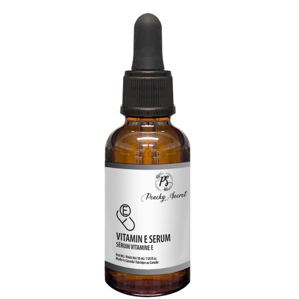 Vitamin E skincare serum bottle with dropper, amber glass and black cap
