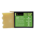 Neem and basil soap bar with pale yellow block and black green-labeled box